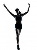 pic of victory  - one caucasian woman runner jogger victorious in silhouette studio isolated on white background - JPG 