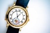 image of watch  - Analog wrist watch closeup on white background - JPG 