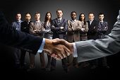 picture of handshake  - handshake isolated on business background - JPG 