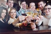 image of restaurant  - Group of happy young people drink wine  at party disco restaurant - JPG 