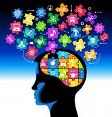 picture of puzzle  - silhouette of a child head with the brain of the puzzles and education icons - JPG 