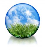 stock photo of orb  - A nature circle orb icon has green grass and a bright blue sky in it - JPG 