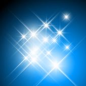 image of blue  - Vector glittering stars on dark blue background - JPG 