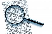 stock photo of magnifying  - Concept photo showing magnifying glass magnifying the words good idea - JPG 