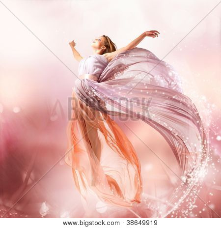 Picture or Photo of Fairy. Beautiful Girl in Blowing Dress Flying. Magic