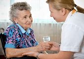 picture of home  - Senior woman with a her home caregiver - JPG 
