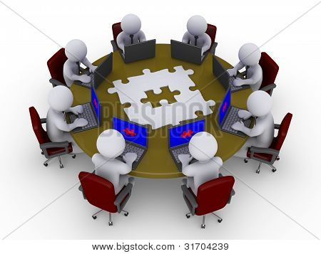 Picture or Photo of 3d businessmen around a table with puzzle are looking at their laptops