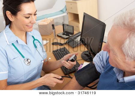Picture or Photo of British nurse taking senior man