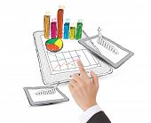 picture of computer  - sketch computer tablet showing a spreadsheet with  charts - JPG 