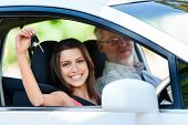 foto of teach  - driving instructor teaching student learner driver - JPG 
