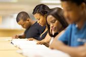 foto of group  - group of african college students reading in library - JPG 