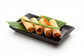 image of roll  - Fried Spring Rolls on Black Dish - JPG 