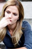stock photo of woman  - Unhappy Depressed Woman frustrated and feeling down - JPG 