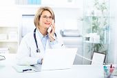 pic of medical doctors  - Medical doctor woman in the office - JPG 