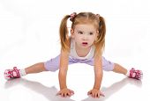 stock photo of competition  - Gymnast cute little girl isolated on a white - JPG 