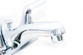image of seep  - High key image of a faucet on a white background - JPG 