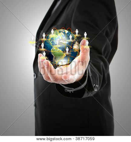 Picture or Photo of Business man holding the small world in his hands against white background (Elements of this image furnished by NASA)