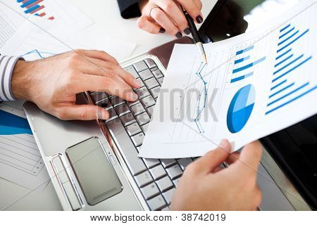 Picture or Photo of Business people discussing during a meeting