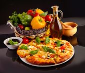 stock photo of black  - Pizza in black - JPG 