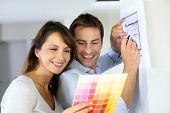 picture of home  - Couple choosing paint colour for their new home - JPG 
