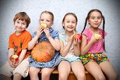 stock photo of preschool  - group of preschool children to eat apples - JPG 