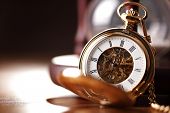 stock photo of watch  - Vintage pocket watch and hour glass or sand timer - JPG 