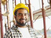 picture of construction  - portrait of latin american construction worker looking at camera - JPG 