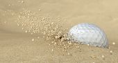 pic of embed  - An extreme close up of a golf ball hitting the sand in a bunker and emitting grains of sand forwards - JPG 
