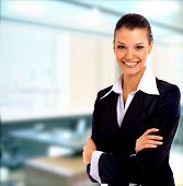 stock photo of business people  - Positive business woman smiling over white background - JPG 