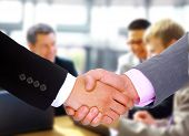 foto of handshake  - handshake isolated on business background - JPG 