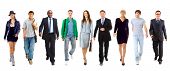 stock photo of team  - Happy young business woman standing in front of her team - JPG 