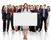 picture of holding  - Businesswoman standing and holding a white empty billboard - JPG 