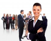 pic of leadership  - Female Business leader standing in front of her team - JPG 