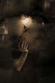 picture of time  - Mystery Woman Holding The Concept Of Time In Her Hands And Hiding Behind A Clock Face As Time Passes In A Mysteries Of Time Concept - JPG 