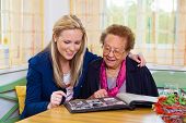 stock photo of  photo  - a grandchild visiting his grandmother - JPG 