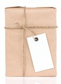 pic of wrapped  - paper parcel wrapped tied with price tag isolated on white background - JPG 