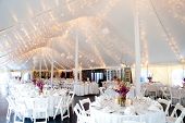 stock photo of inside  - wedding tables set for fine dining inside a tent
 - JPG 