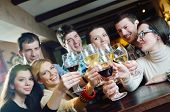 stock photo of group  - Group of happy young people drink wine  at party disco restaurant - JPG 