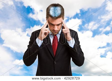 Picture or Photo of Concentrated businessman trying to focus his mind