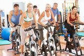 picture of people  - Group Of People In Cycle Class In Gym - JPG 