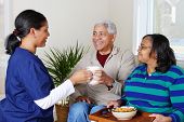 foto of health  - Home health care worker and an elderly couple - JPG 