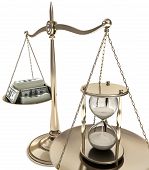 picture of money  - The money is blurred the focus is the hourglass - JPG 