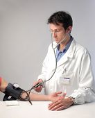 pic of pressure  - Doctor measuring a man - JPG 