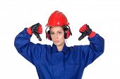 image of industrial  - Industrial worker woman with the thumbs down isolated on white background - JPG 