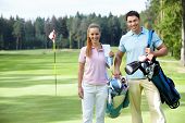 pic of golf  - Young couple on the golf course - JPG 