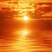 picture of sunset  - Sunset sky reflection over a sea - JPG 