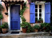 image of france  - This house in the South of France has colors that are so warm and inviting that you want to go inside for a glass of wine - JPG 