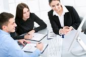 stock photo of meeting  - Business team at a meeting in a  modern office environment - JPG 