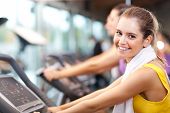 picture of fitness  - Happy people doing indoor biking in a fitness club - JPG 