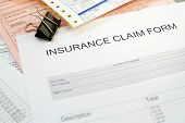 stock photo of medical  - Health insurance claim form and medical bills - JPG 